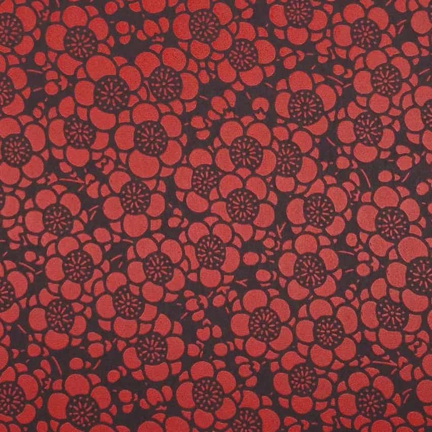 Urushi-Style Washi
– Pflaumenblüten auf glänzend schwarzem Hintergrund – handbedrucktes Washi-Papier